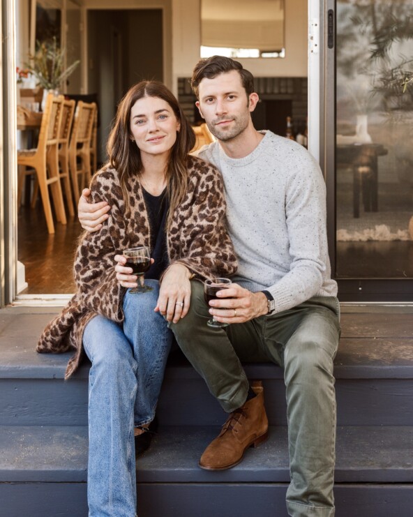 betsy sadler and husband greg, fall dinner party in los angeles - leopard coat